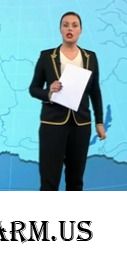 Во что она одета?